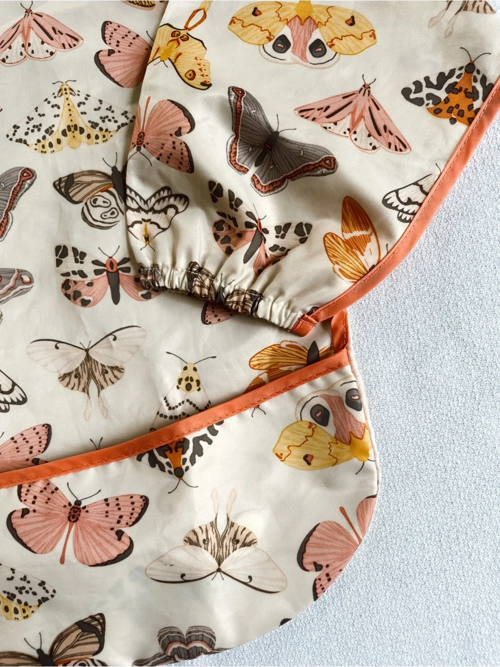 TINY TWINKLE Tiny Twinkle Mess Long Sleeve Bib Apron Art Food Butterfly Moth